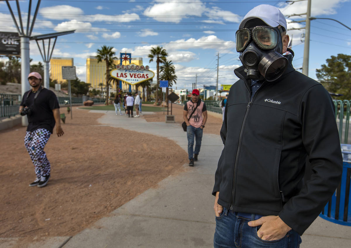 Gerard Moreno makes a stop at the "Welcome to Fabulous Las Vegas Nevada" sign amid a ...