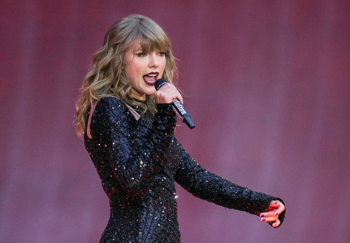 In this June 22, 2018, file photo, singer Taylor Swift performs on stage in concert at Wembley ...