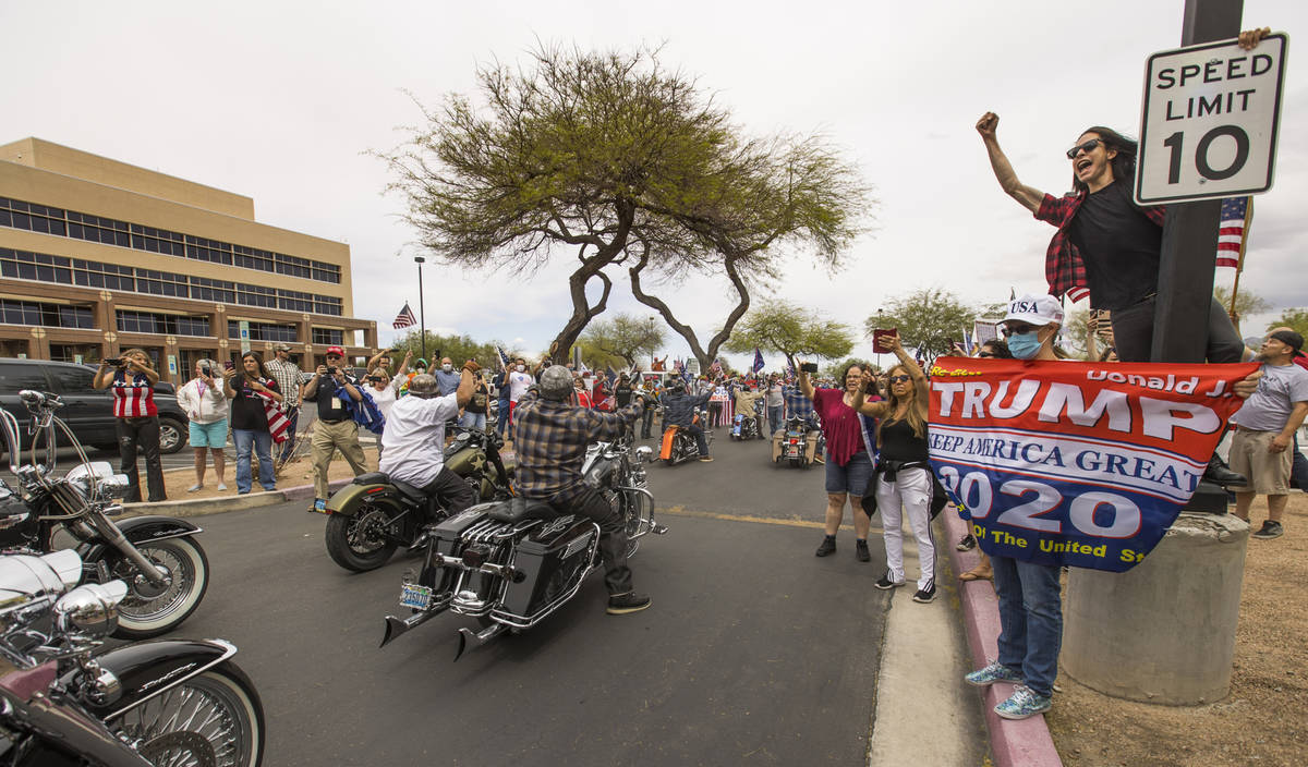 A pack of motorcyclists arrive to join the many others during the Reopen Nevada protest at the ...