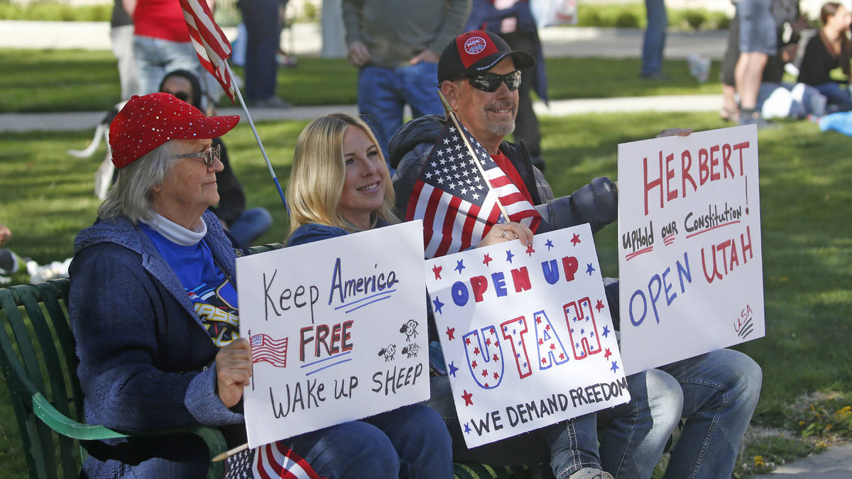 People gather during the Utah Business Revival rally, calling for Utah's economy to be reopened ...