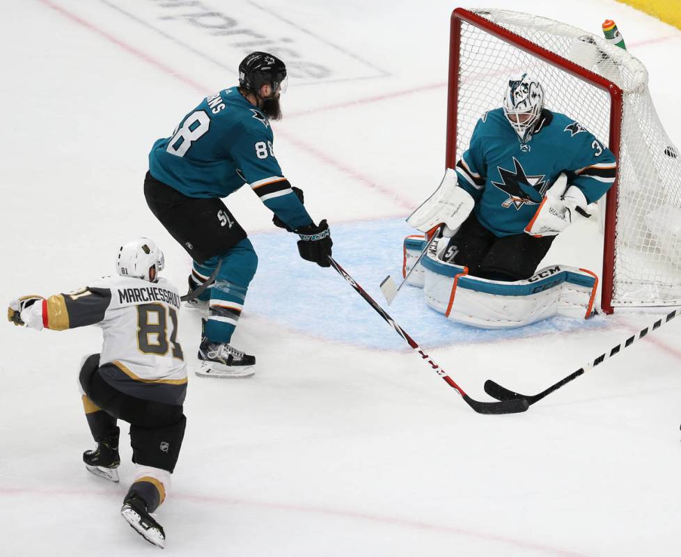 Knights center Jonathan Marchessault (81) scores against San Jose Sharks goaltender Martin Jone ...