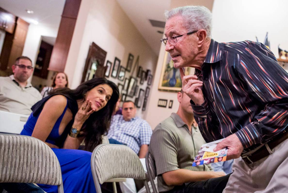 Ben Lesser, a 91-year-old Holocaust survivor, shows where he was stabbed in the chin while on a ...