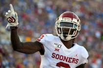 FILE - In this Sept. 14, 2019, file photo, Oklahoma wide receiver CeeDee Lamb celebrates after ...