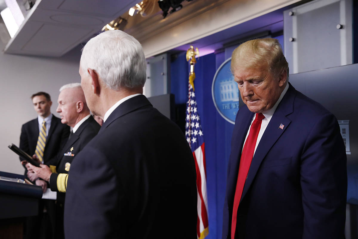 President Donald Trump and Vice President Mike Pence listen as Adm. Brett Giroir, assistant sec ...