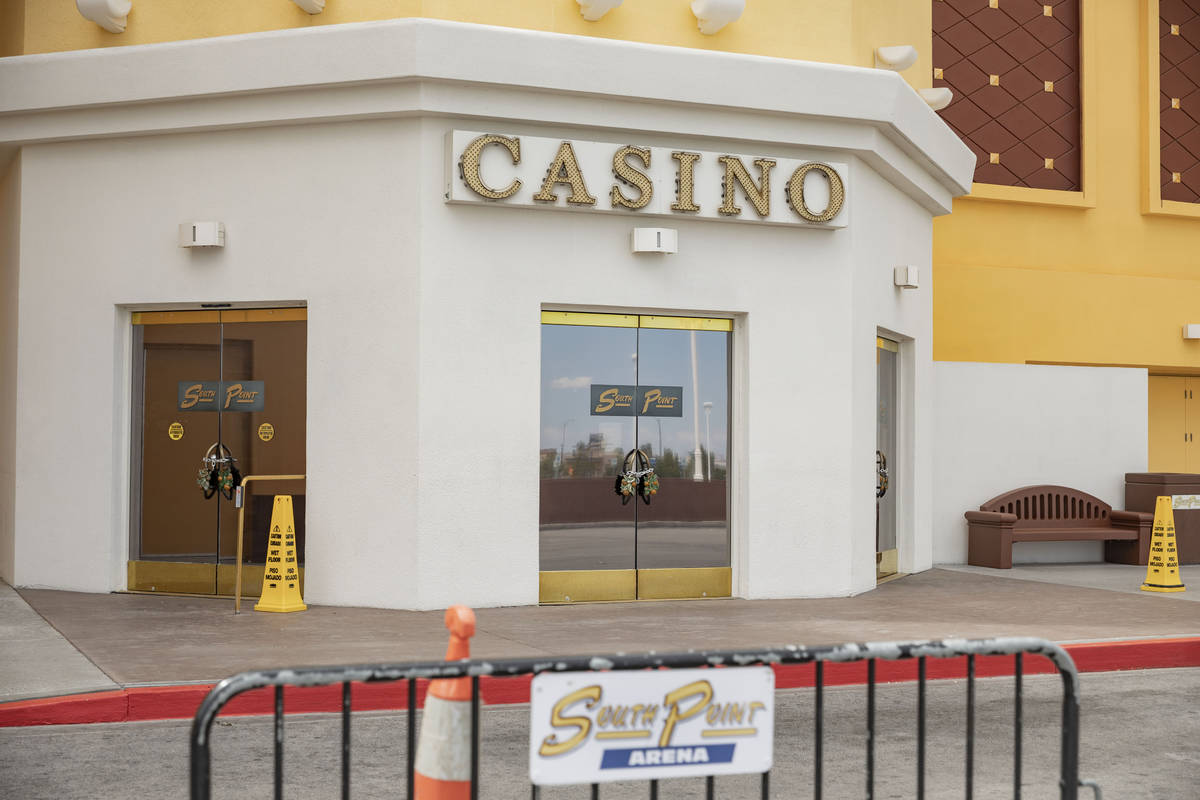 A barrier and chained door handles are seen at an entrance to South Point, in Las Vegas on Mond ...