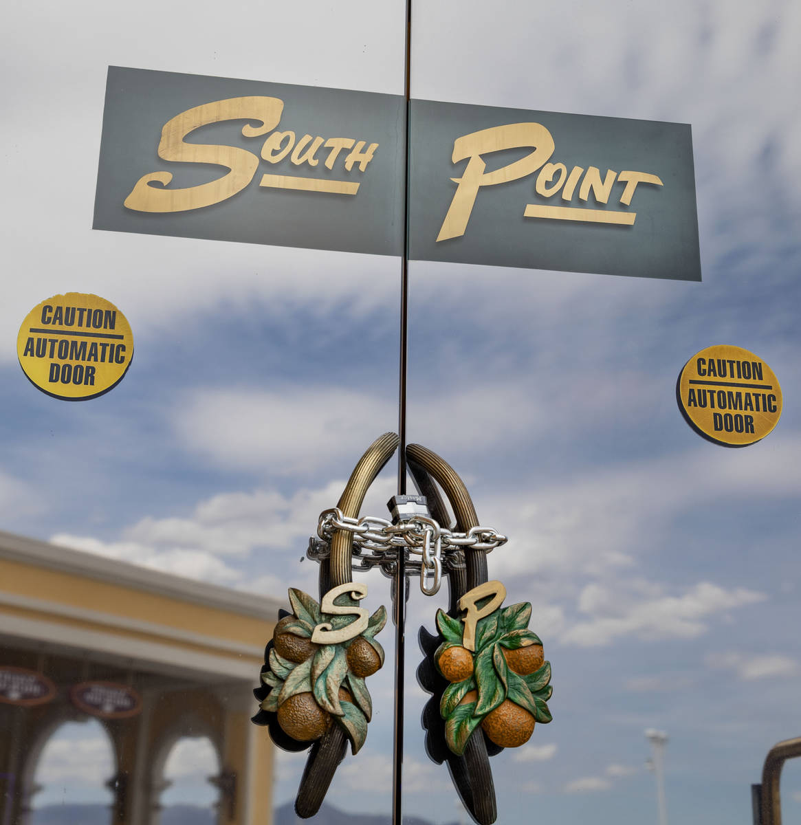 Locked chains cover the entrance to South Point is seen while temporarily closed in Las Vegas o ...