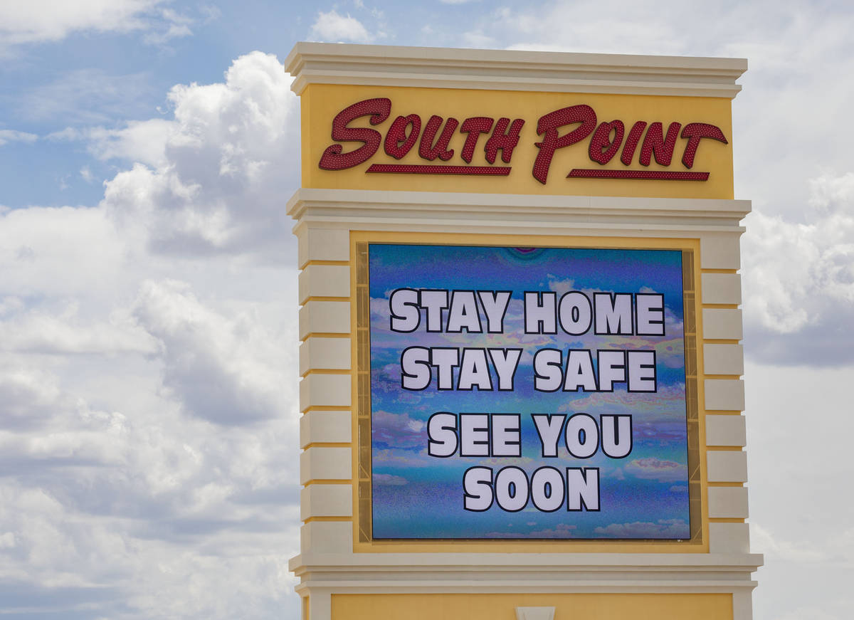 A South Point electronic marquee sign sends a message to stay home, at South Point in Las Vegas ...