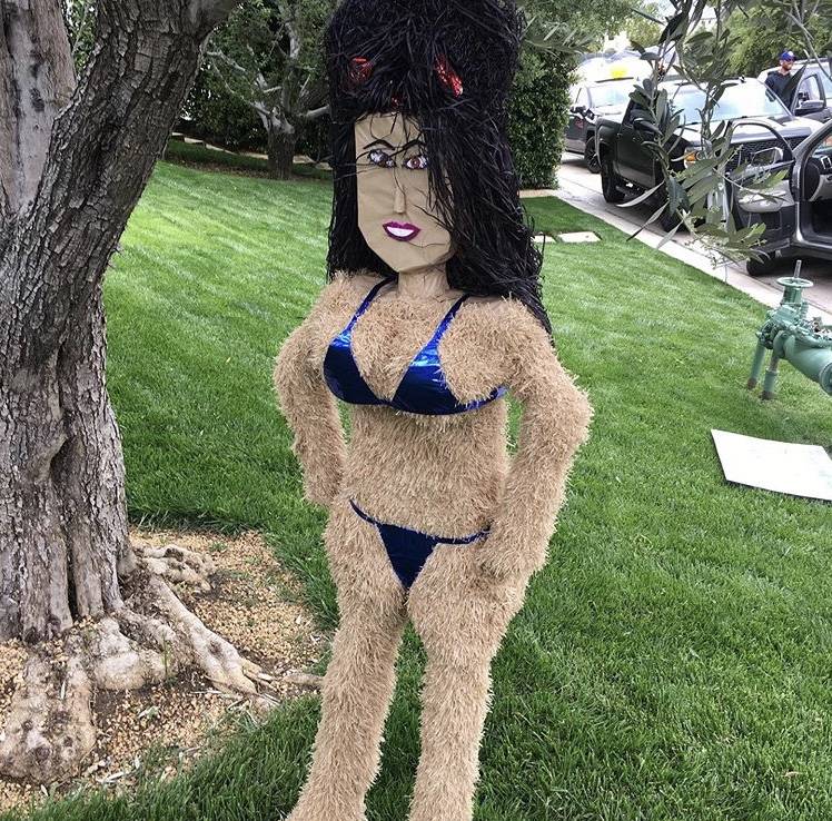 Omar Soto's Kourtney Kardashian pinata hangs in the front yard of the reality star's home in Ca ...