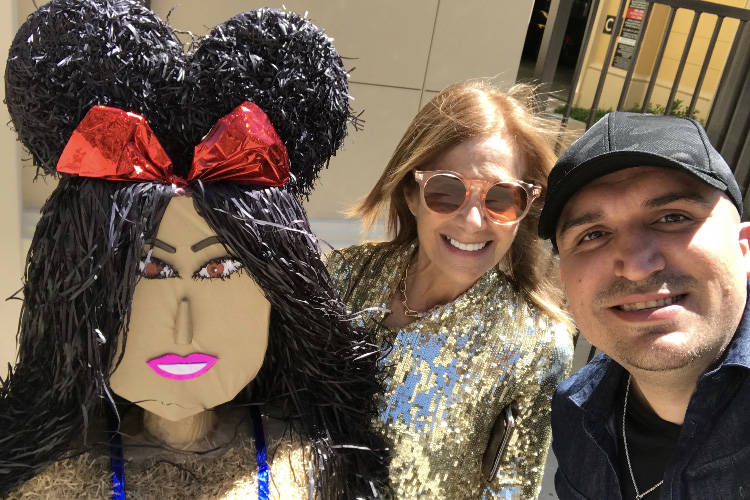 Las Vegas artist Omar Soto meets Cici Bussey after delivering her custom Kourtney Kardashian pi ...