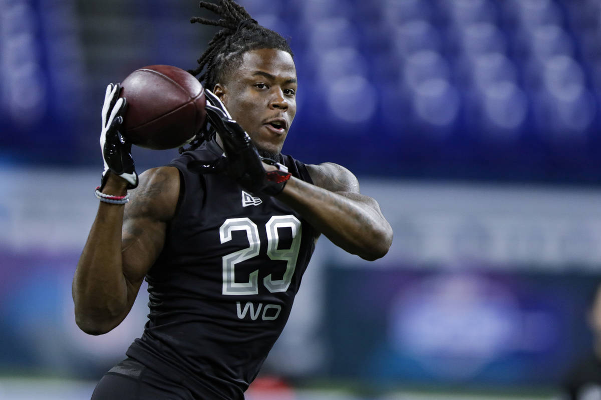Alabama wide receiver Jerry Jeudy runs a drill at the NFL football scouting combine in Indianap ...