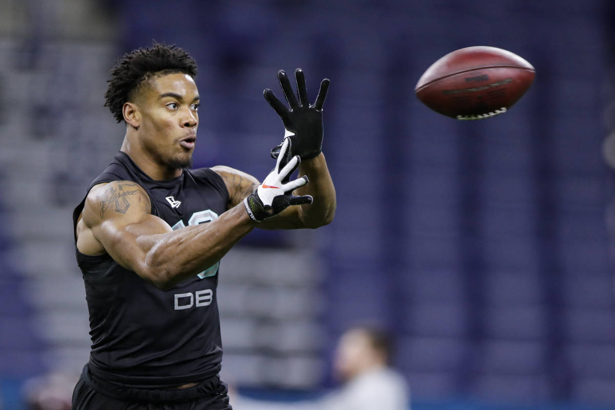 Southern Illinois defensive back Jeremy Chinn runs a drill at the NFL football scouting combine ...