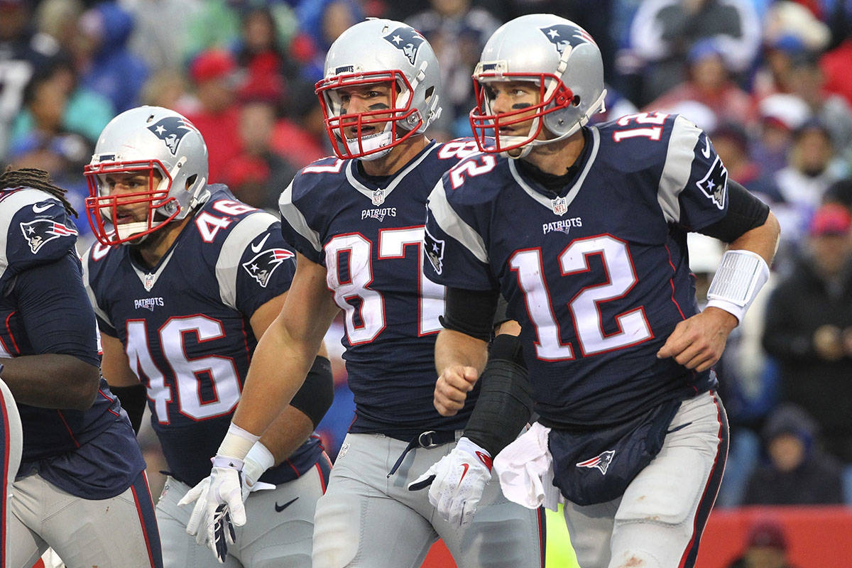 FILE - In this Oct. 30, 2016, file photo, New England Patriots' Tom Brady (12), Rob Gronkowski ...