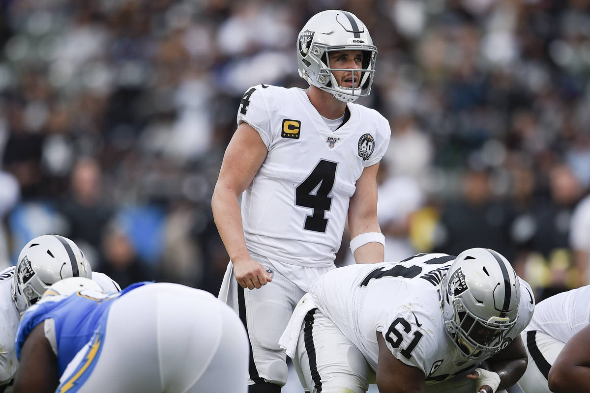 Raiders quarterback Derek Carr in action during the second half of an NFL football game against ...
