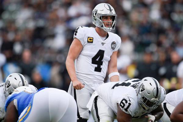 Raiders quarterback Derek Carr in action during the second half of an NFL football game against ...
