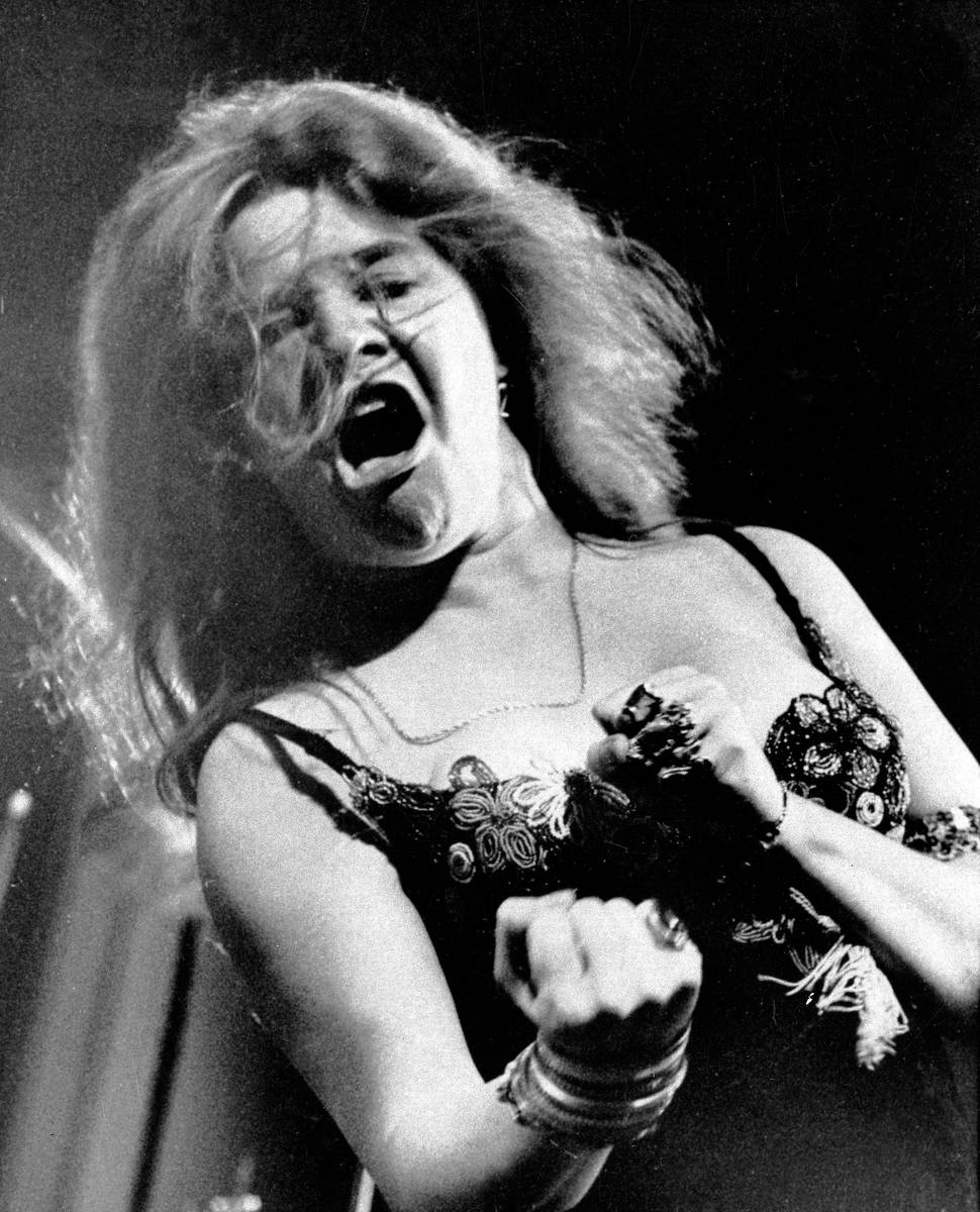 FILE - In this July 29, 1968, file photo, blues/rock singer Janis Joplin performs at the Newpor ...