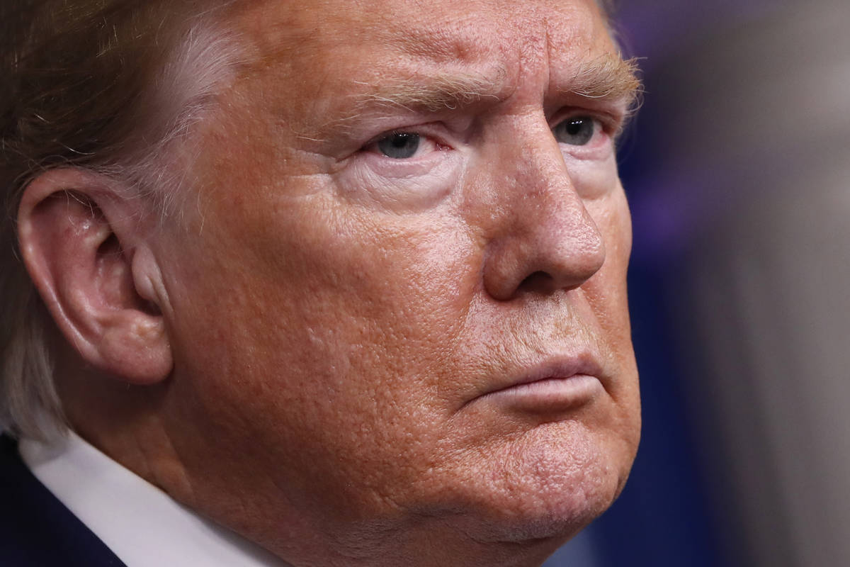 President Donald Trump listens during a briefing about the coronavirus in the James Brady Press ...