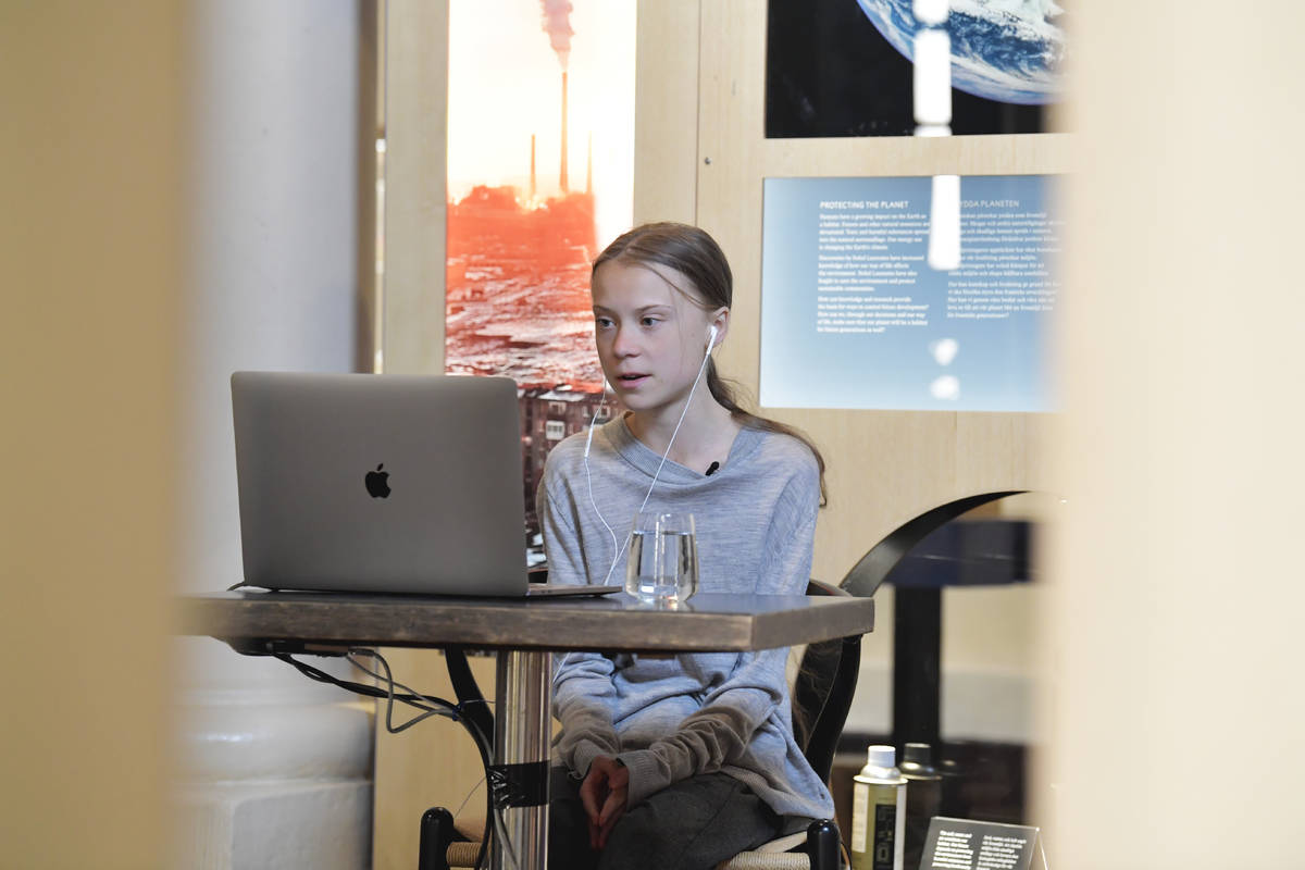 Environmental activist Greta Thunberg talks via video link with Professor of Environmental Scie ...