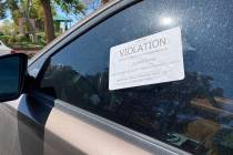 Last week, white stickers could be seen stuck to windows on a line of vehicles parked on Cozy H ...