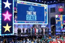 Top college prospects are seen on the stage before the first round of the NFL football draft, i ...