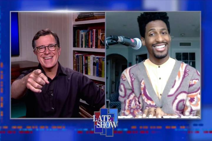 Stephen Colbert, left, and bandleader Jon Batiste are shown during an episode of "The Late Show ...