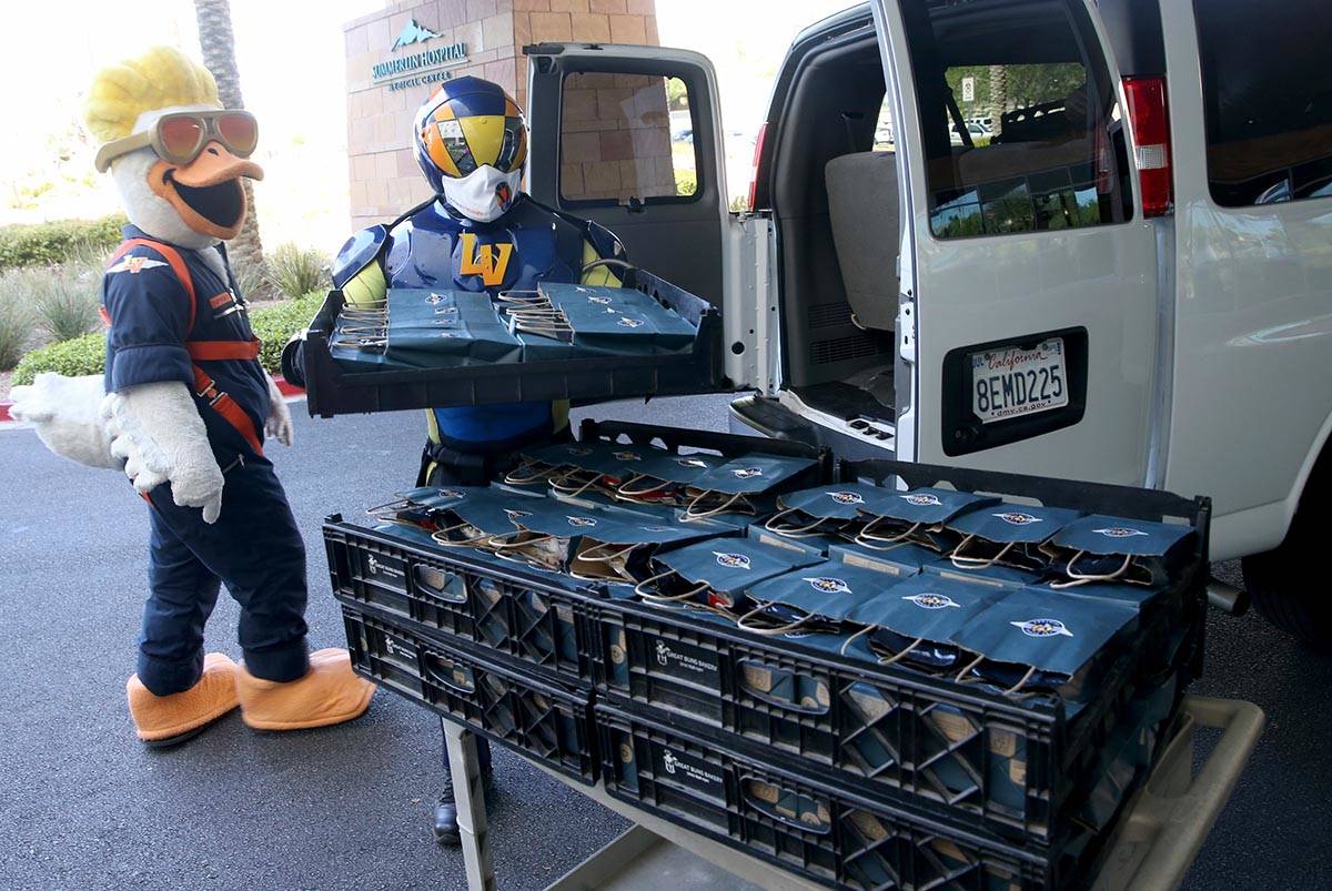 Las Vegas Aviators mascots Spruce and Aviator donate baseball swag at Summerlin Hospital Medica ...