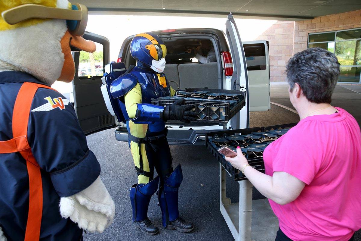 Las Vegas Aviators mascots Spruce and Aviator donate baseball swag at Summerlin Hospital Medica ...