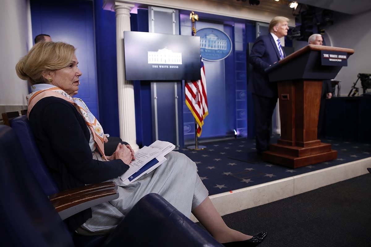 Dr. Deborah Birx, White House coronavirus response coordinator, listens as President Donald Tru ...