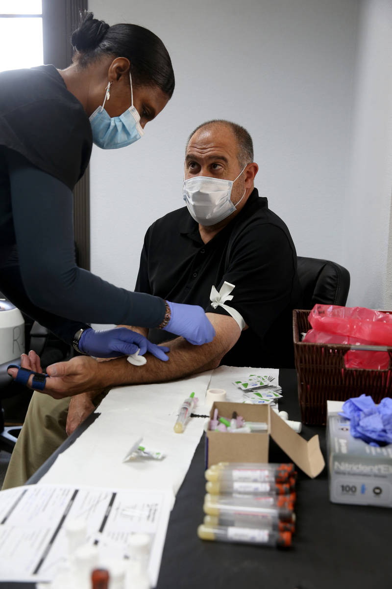 Leo Gobbo, 55, human resources manager at Designs for Health, receives voluntary COVID-19 antib ...