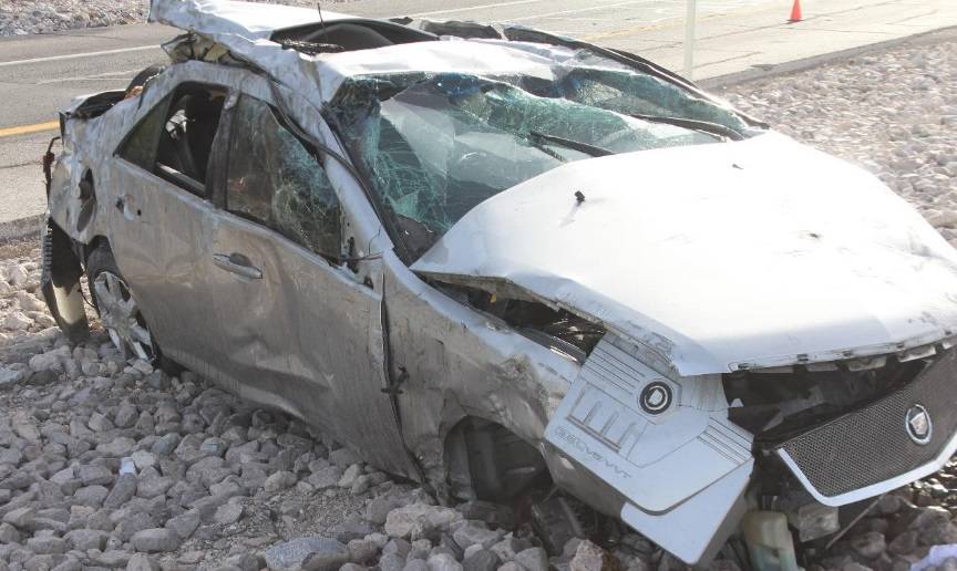 The scene of a fatal car crash on Summerlin Parkway near Anasazi Drive in Las Vegas, Thursday, ...