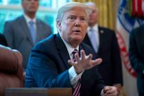 President Donald Trump speaks after signing a coronavirus aid package to direct funds to small ...