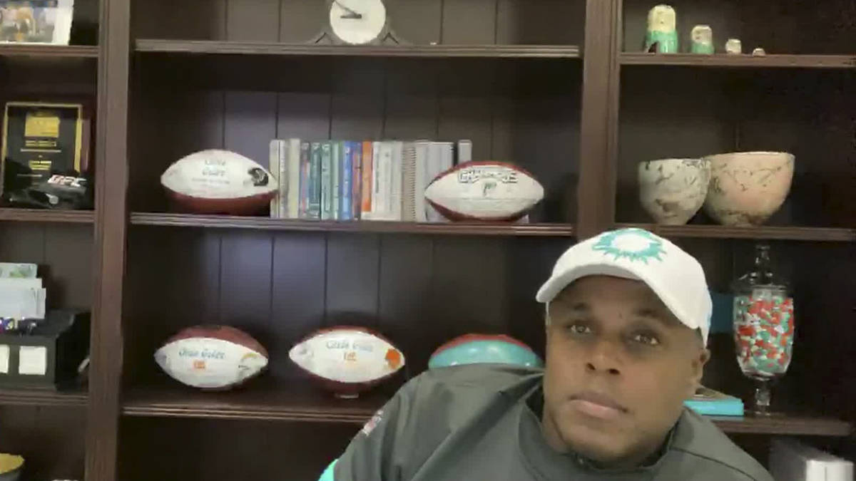 In this still image from video provided by the NFL, Miami Dolphins general manager Chris Grier ...