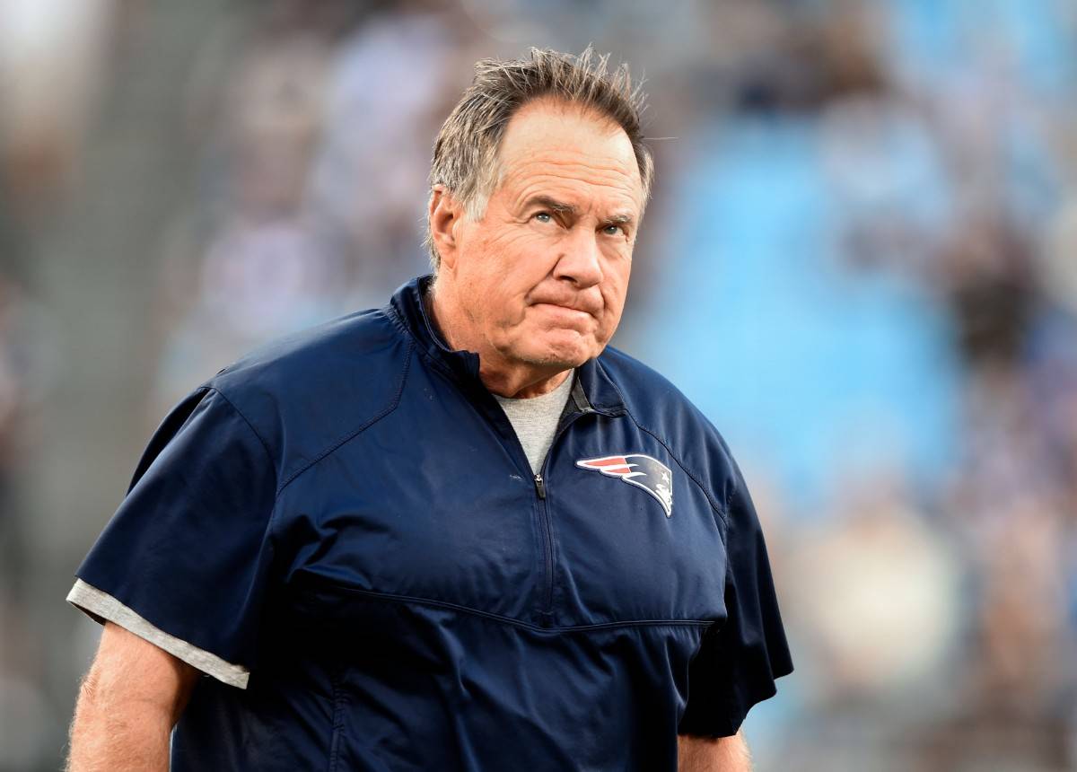 New England Patriots head coach Bill Belichick takes the field before a preseason NFL football ...