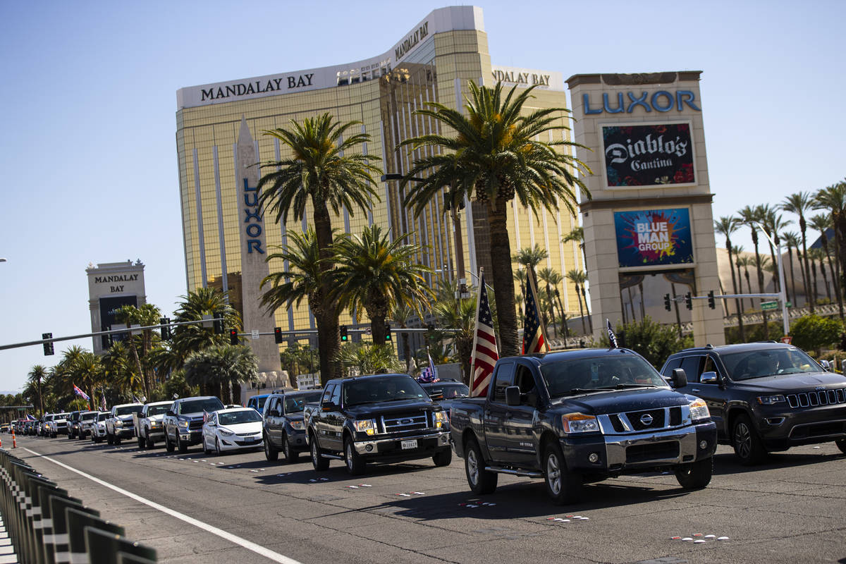 People participate in a "caravan" protest led by Wayne Allyn Root, not pictured, alon ...