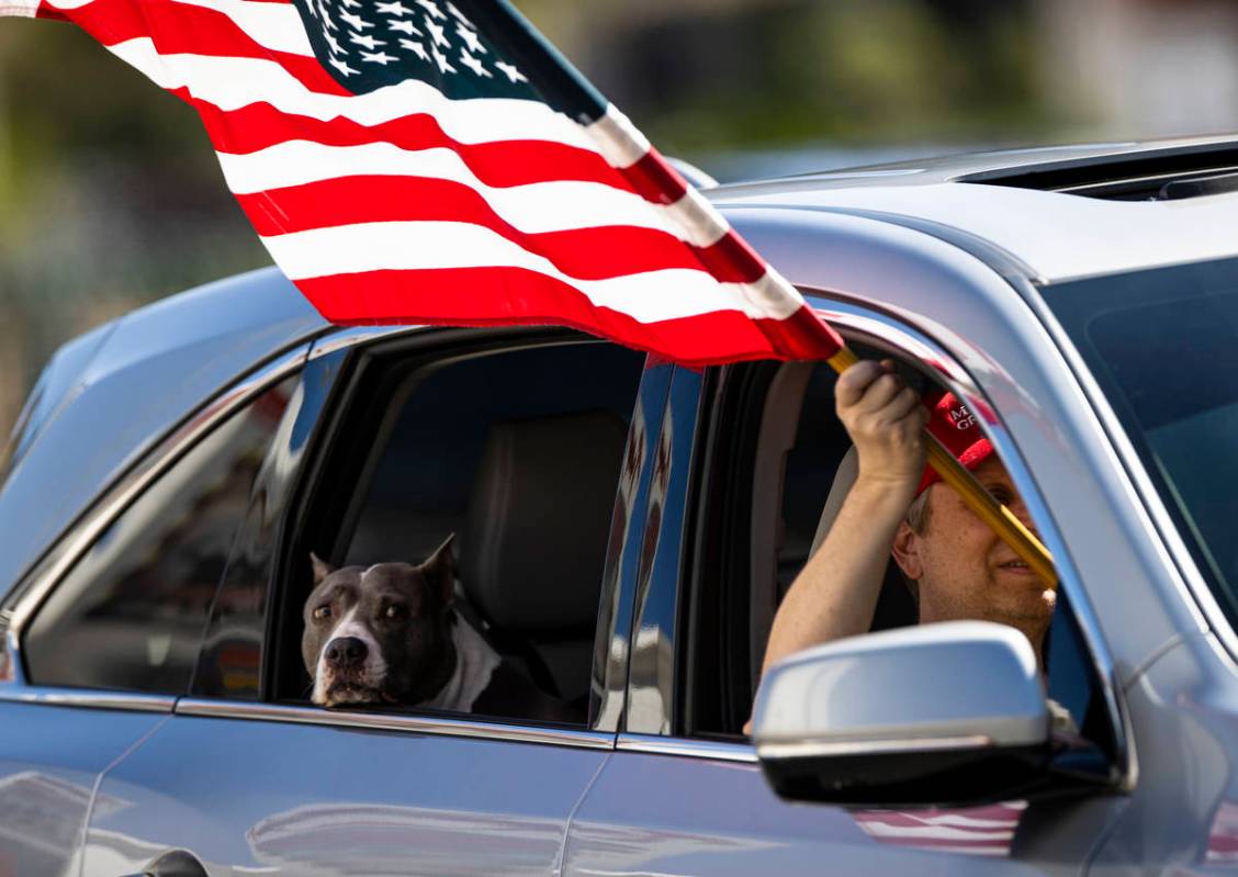 People participate in a "caravan" protest led by Wayne Allyn Root, not pictured, alon ...