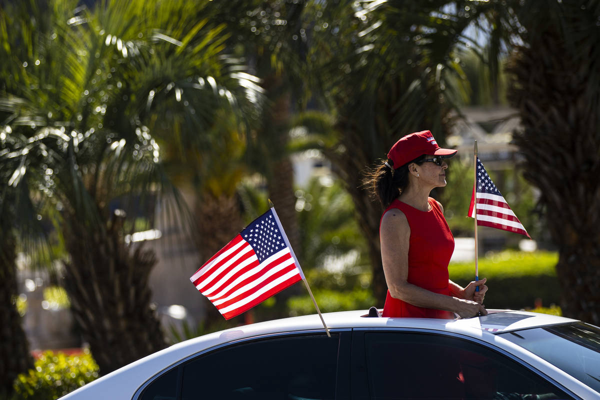 People participate in a "caravan" protest led by Wayne Allyn Root, not pictured, alon ...