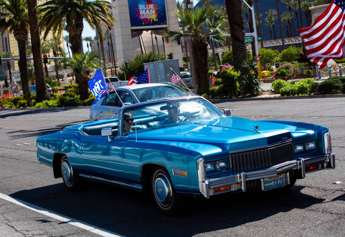 People participate in a "caravan" protest led by Wayne Allyn Root, not pictured, alon ...