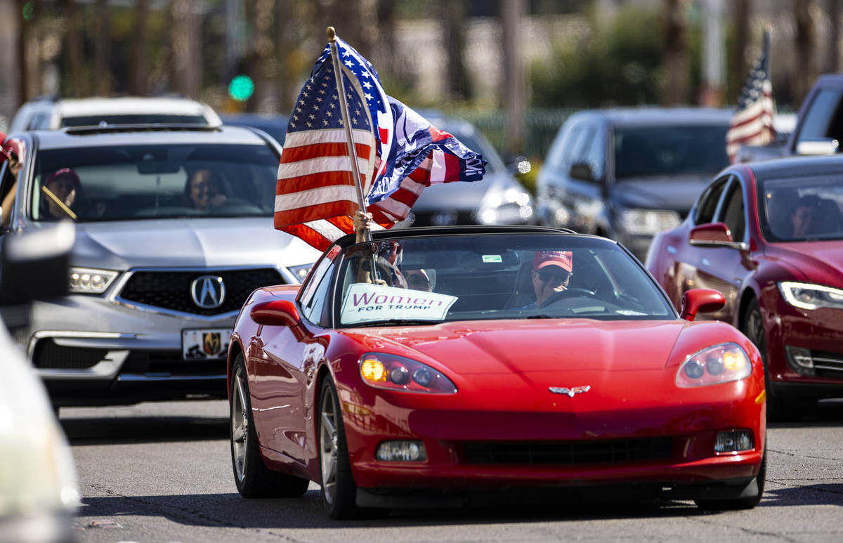 People participate in a "caravan" protest led by Wayne Allyn Root, not pictured, alon ...