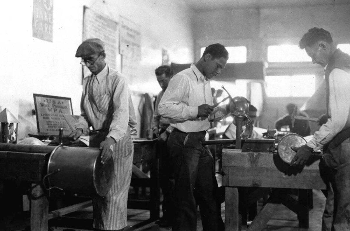 In this March 26, 1937, file photo, Works Progress Administration (WPA) workers make copper ute ...
