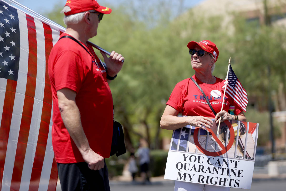 Joe Nemeth, left, and his wife Joann of Las Vegas, attend a Fight For Nevada rally outside of t ...