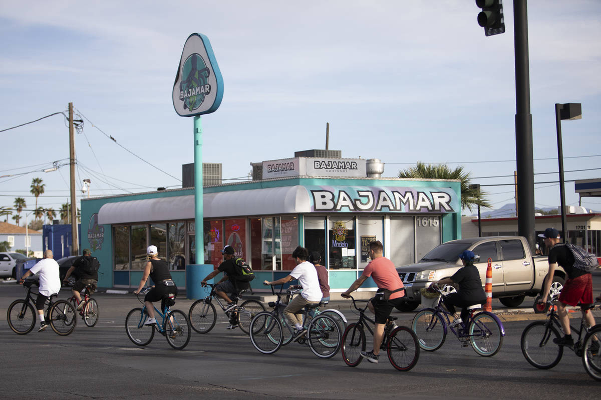 A group of bikers crosses Las Vegas Boulevard headed toward the Strip on Saturday, April 25, 20 ...