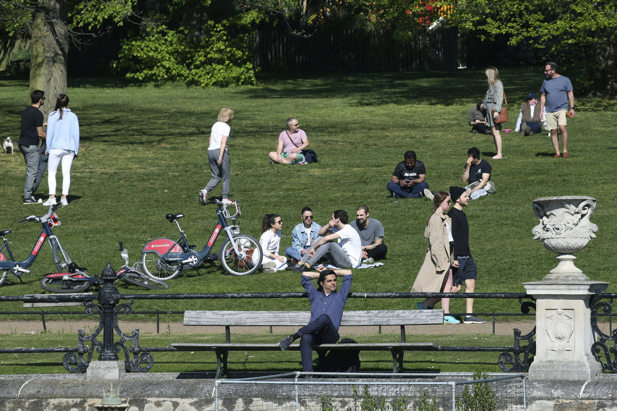 People enjoy the weather in Kensington Gardens, as the UK continues its lockdown to help curb t ...