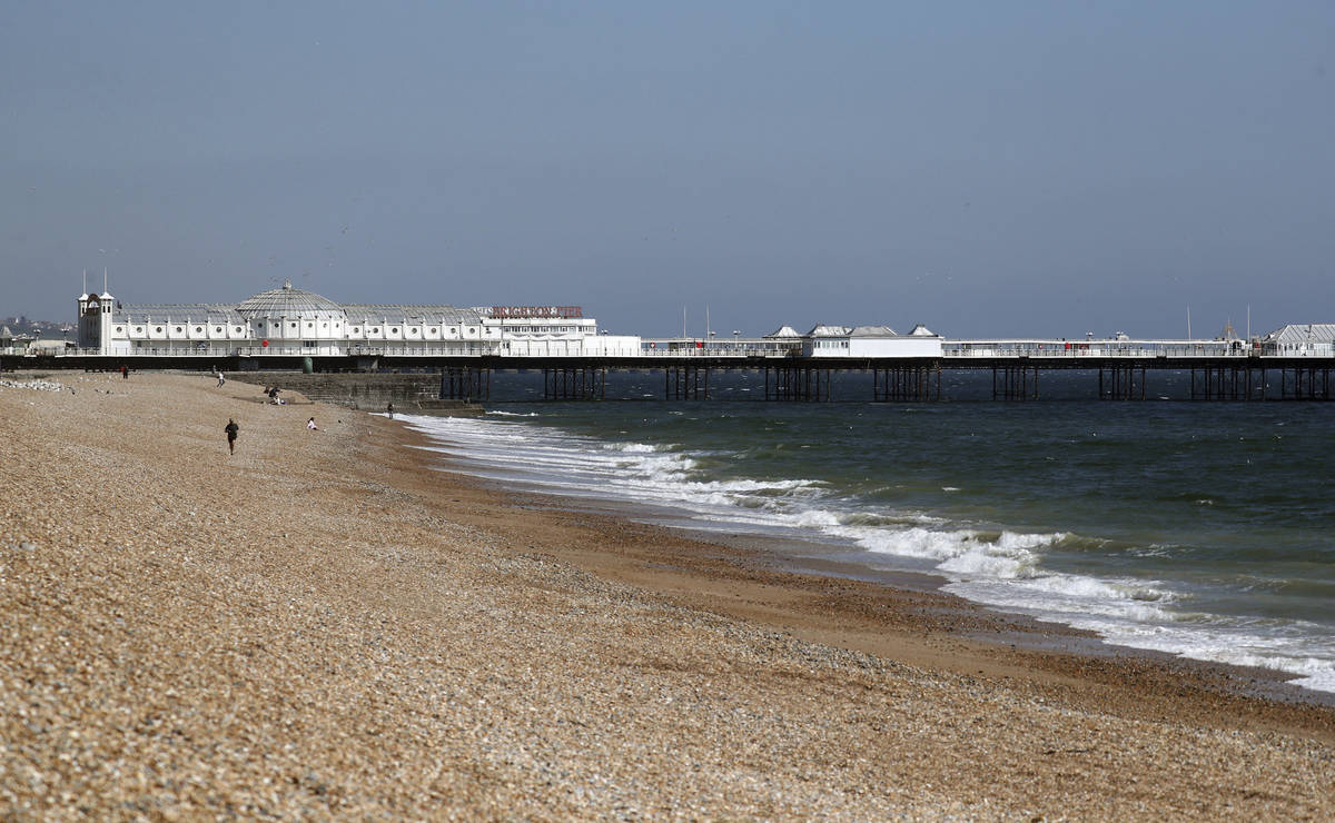 A view of a virtually empty beach in Brighton as the UK continues its lockdown to help curb the ...