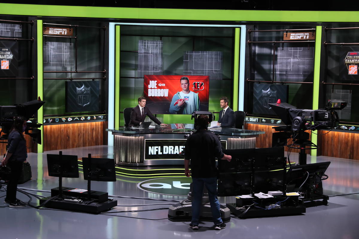 In a photo provided by ESPN Images, ESPN provides coverage of the NFL football draft, Thursday, ...