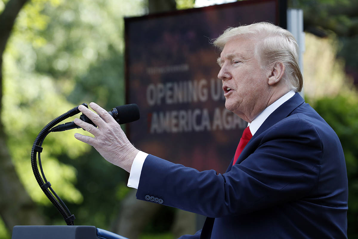 President Donald Trump speaks about the coronavirus in the Rose Garden of the White House, Mond ...