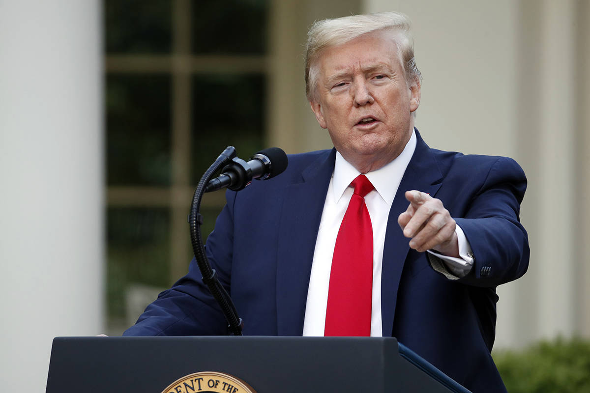 President Donald Trump speaks about the coronavirus in the Rose Garden of the White House, Mond ...