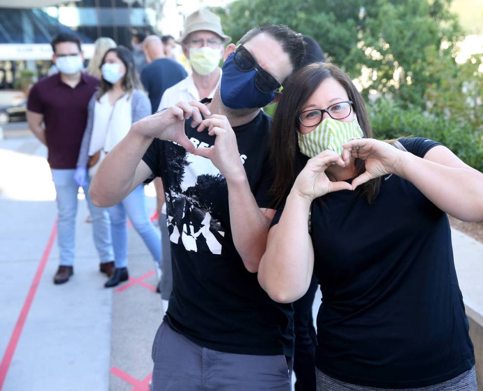 Couples, including first-in-line Jenny Paez and George Wells of Las Vegas, right, wait for for ...