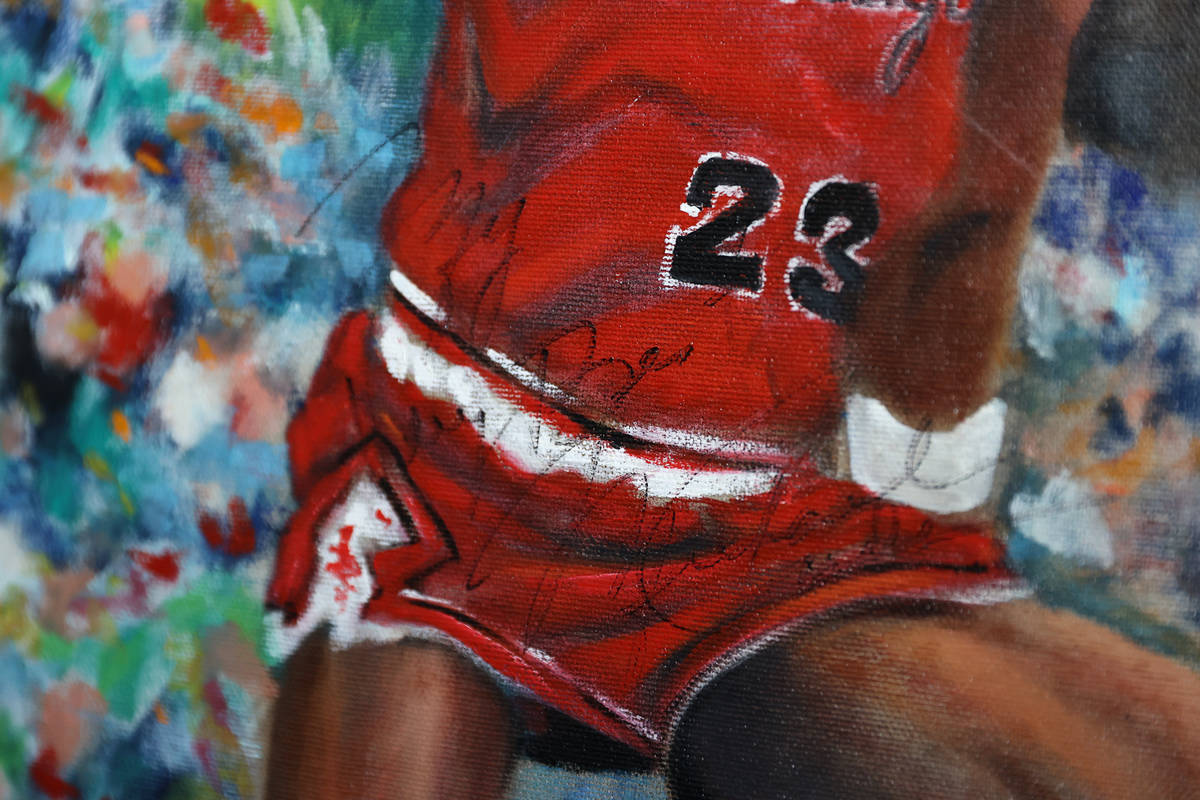 A signed Michael Jordan painting inside the home of Trent Othick in Las Vegas, Tuesday, April 2 ...