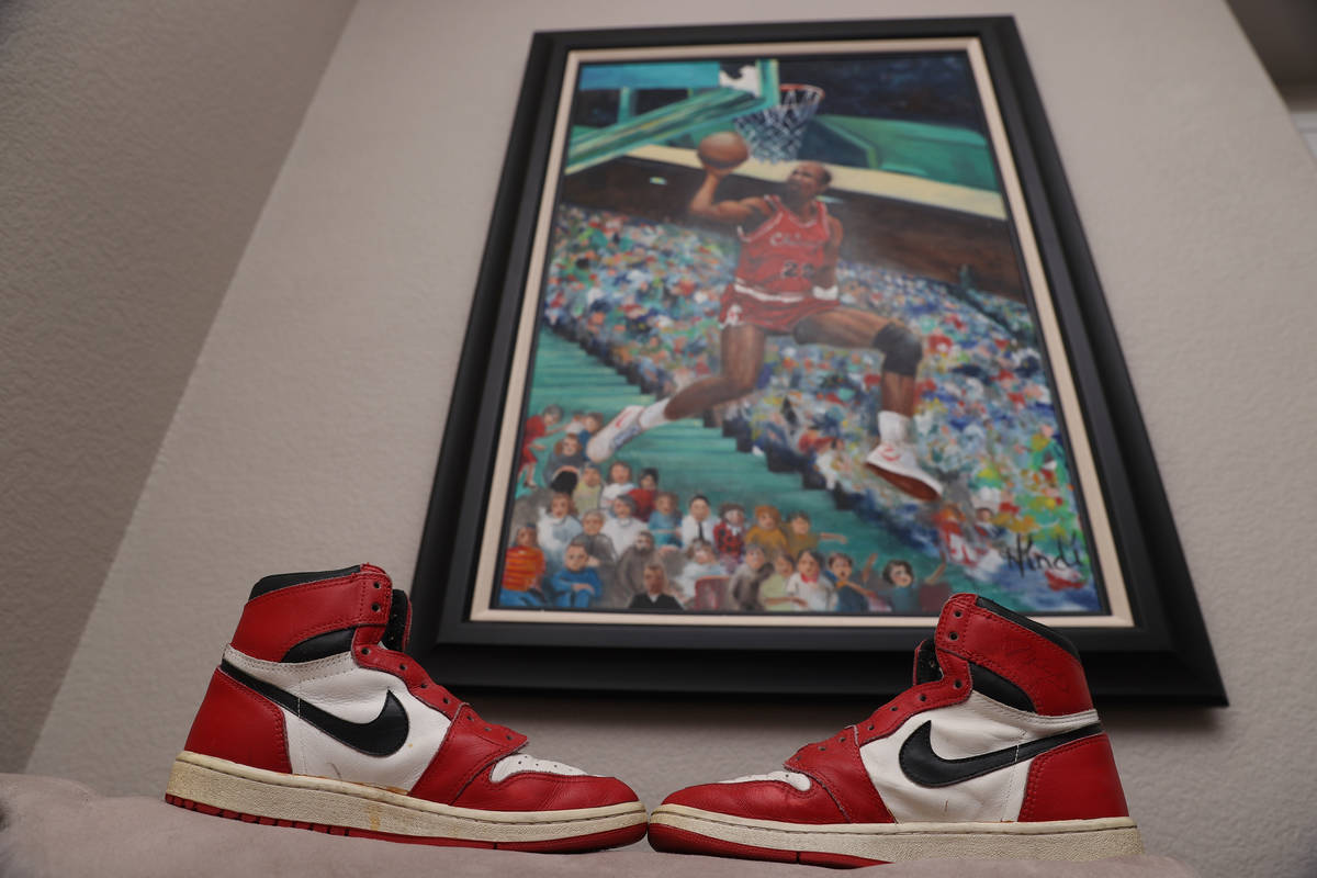 Air Jordan 1 shoes in front of a Michael Jordan waiting at the home of Trent Othick in Las Vega ...