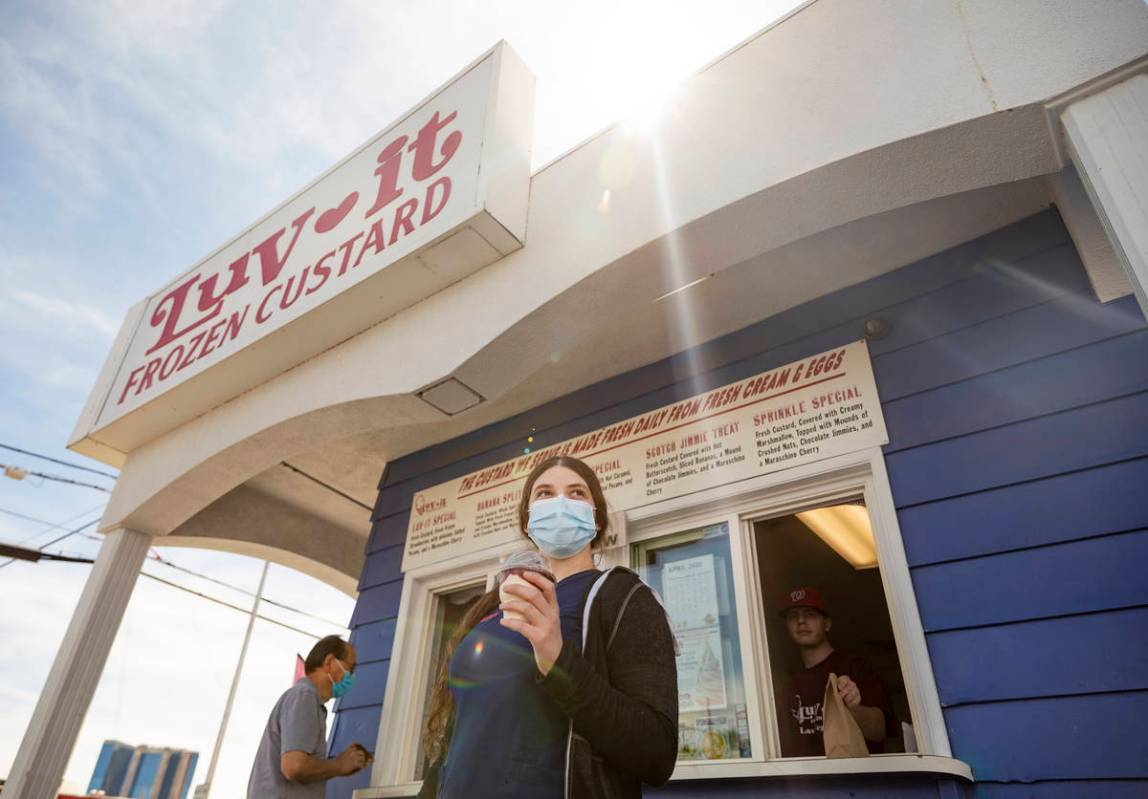 Healthworker Cameron Fleming of Las Vegas gets her to-go order from Luv-It Frozen Custard in La ...