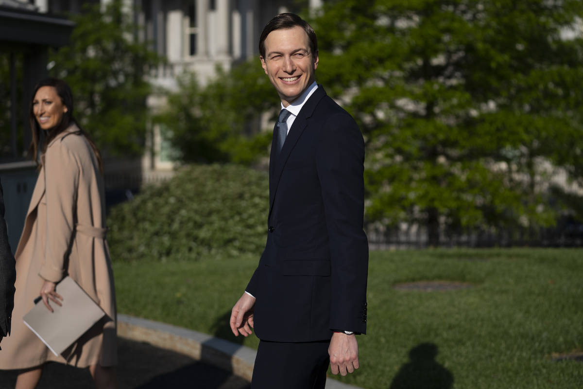 White House senior adviser Jared Kushner walks past reporters after doing an interview at the W ...